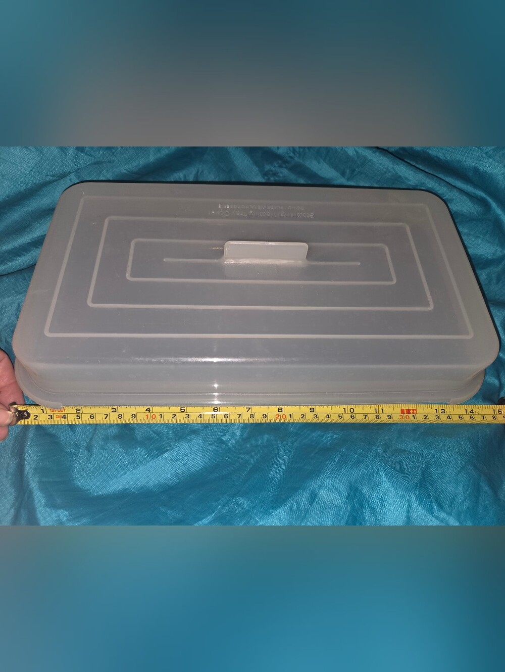 Rotisserie steaming heating tray and lid.